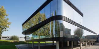 The Curve by E V A: all-glass facade maximizes visibility and light penetration of this office building