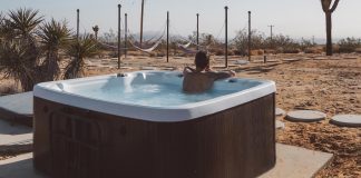 Smart ways to integrate an inflatable hot tub into your backyard design